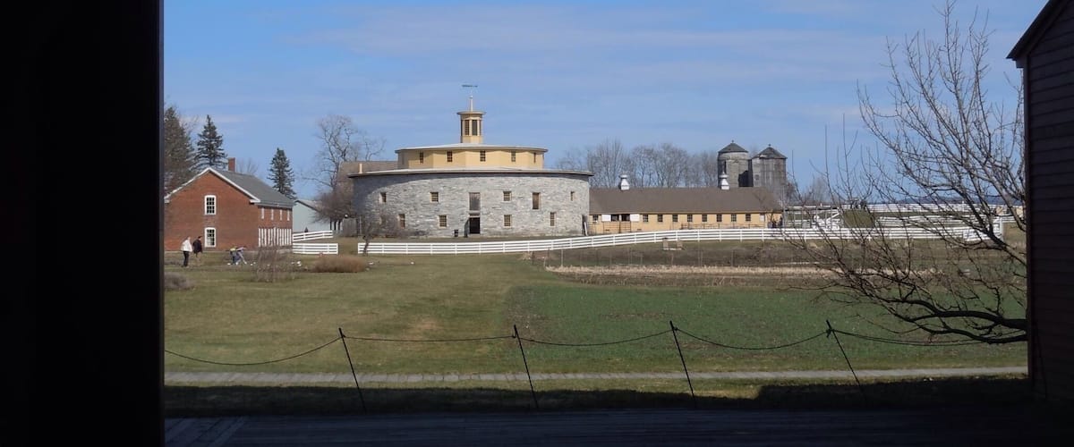 #Trovember Round barn at Hancock Shaker Village. I've been wanting to explore here since visiting the Shaker Village in Canterbury, NH  also the one in Sabbathday Lakes, Maine. The history, culture and Shaker way of life is so interesting and appealing in its simplicity. We visited in April and were excited to meet and0wt the newly born farm animals. We took a tour to hear about daily life in a Shaker Village and then enjoyed a walking trail through woods and meadow and finished off with some delicious ice cream. "Tis a Gift to be Simple, 'Tis a Gift to be Free..." and it's a gift to explore this well-preserved living history museum!