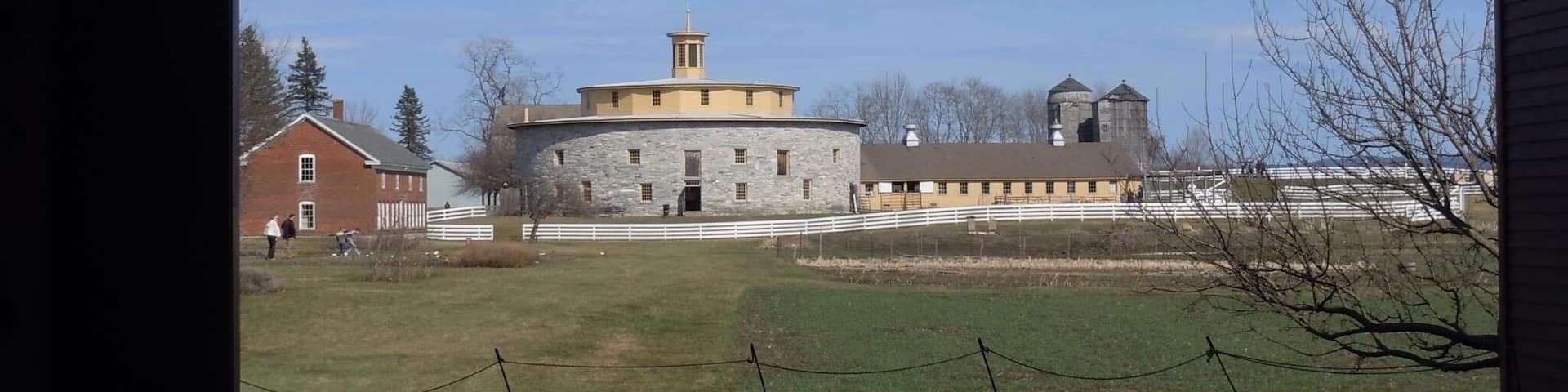 #Trovember Round barn at Hancock Shaker Village. I've been wanting to explore here since visiting the Shaker Village in Canterbury, NH also the one in Sabbathday Lakes, Maine. The history, culture and Shaker way of life is so interesting and appealing in its simplicity. We visited in April and were excited to meet and0wt the newly born farm animals. We took a tour to hear about daily life in a Shaker Village and then enjoyed a walking trail through woods and meadow and finished off with some delicious ice cream. "Tis a Gift to be Simple, 'Tis a Gift to be Free..." and it's a gift to explore this well-preserved living history museum!