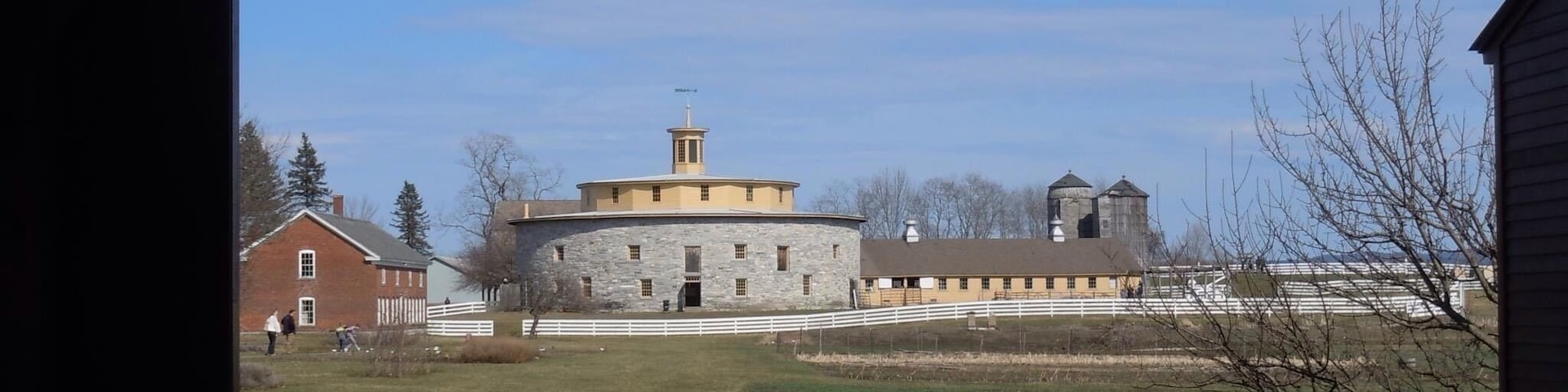 #Trovember Round barn at Hancock Shaker Village. I've been wanting to explore here since visiting the Shaker Village in Canterbury, NH also the one in Sabbathday Lakes, Maine. The history, culture and Shaker way of life is so interesting and appealing in its simplicity. We visited in April and were excited to meet and0wt the newly born farm animals. We took a tour to hear about daily life in a Shaker Village and then enjoyed a walking trail through woods and meadow and finished off with some delicious ice cream. "Tis a Gift to be Simple, 'Tis a Gift to be Free..." and it's a gift to explore this well-preserved living history museum!