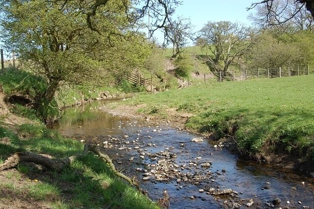 Wilkieston Burn. This small burn flows from Wilkieston Farm about 2kms from here and drains into the Ceres Burn about 500mts behind me. It's not got a large catchment area but has no boggy ground or forestry to soak up any rain fall and with farmland on either side it can rise very quickly in a deluge. Looking up stream from just above the B940
