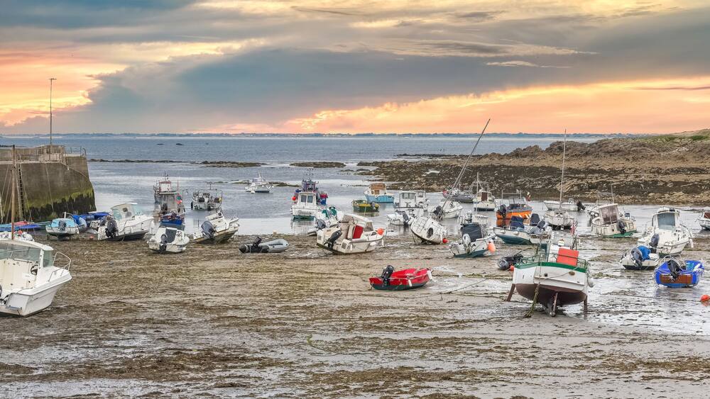 Carnac in Brittany, near the gulf of Morbihan, traditional harbor and beach, stormy weather