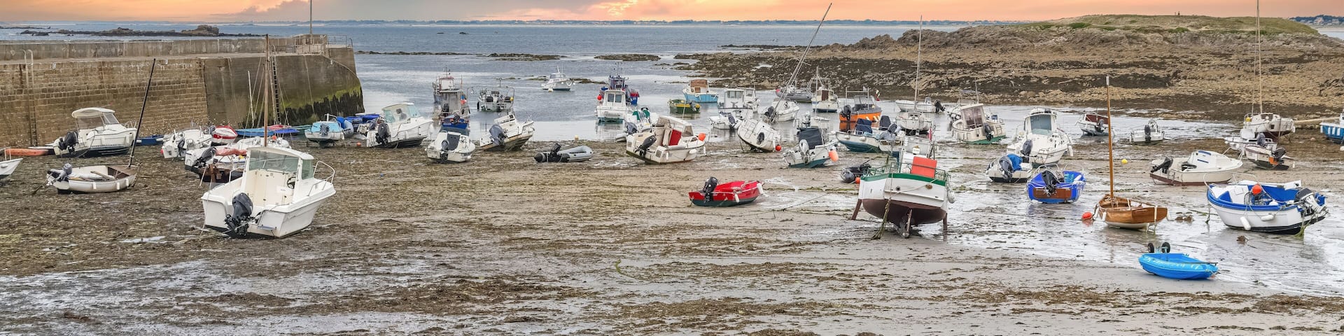 Carnac in Brittany, near the gulf of Morbihan, traditional harbor and beach, stormy weather