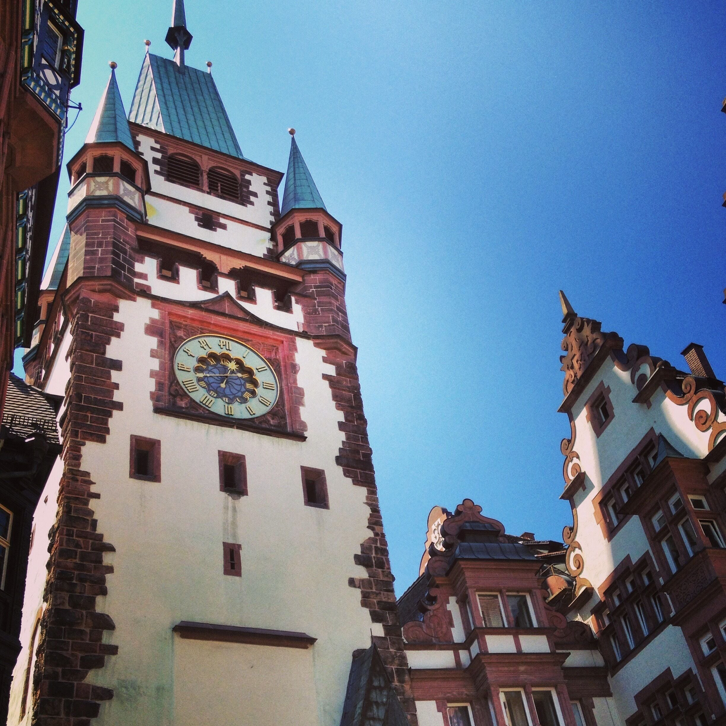 When I lived in Freiburg, Germany, I started a free walking tour company, and the Martinstor was my favorite building. It was built in 1200AD, one of four gates protecting the medieval city. Only two remain, as the others were demolished to make way for automobiles. Martinstor was spared, but it did undergo some changes - it was made larger to accommodate traffic. My favorite story though, is this: there is a blank space on the front (seen at the very bottom of this picture). There used to be a painting of St. Martin of Tours, France there, but in the 1960's it was taken down, to be replaced with something more reflective of today's German Freiburg. But nearly 50 years later, it hasn't been decided what should go in its spot, so it's still a blank space! German bureaucracy at its finest. #architecture