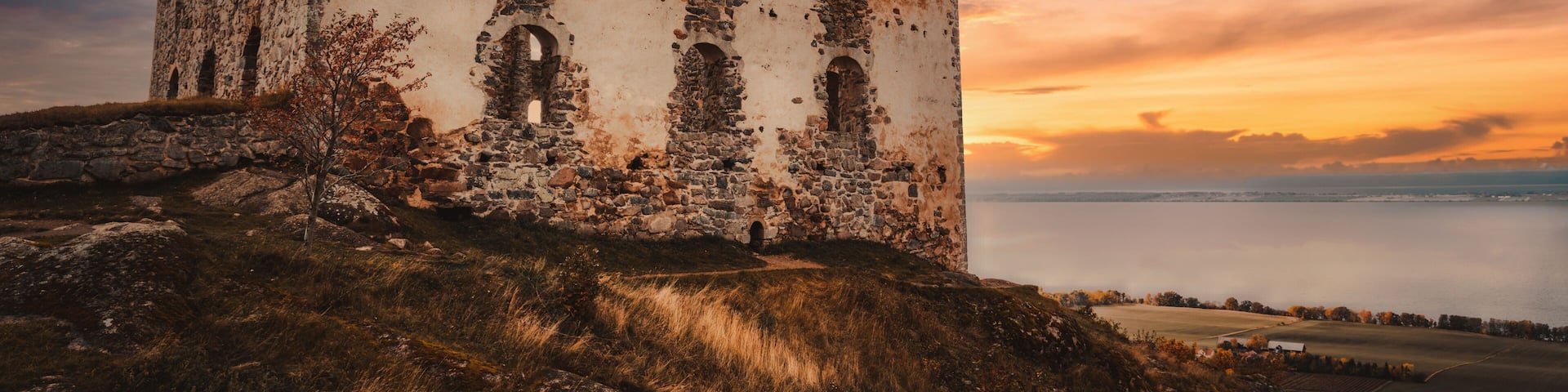 The ruins of Brahehus Castle are located by the lake Vattern near Granna in Smaland, Sweden. The castle was abandoned by the 1680s and suffered a fire in 1708. Selective focus.