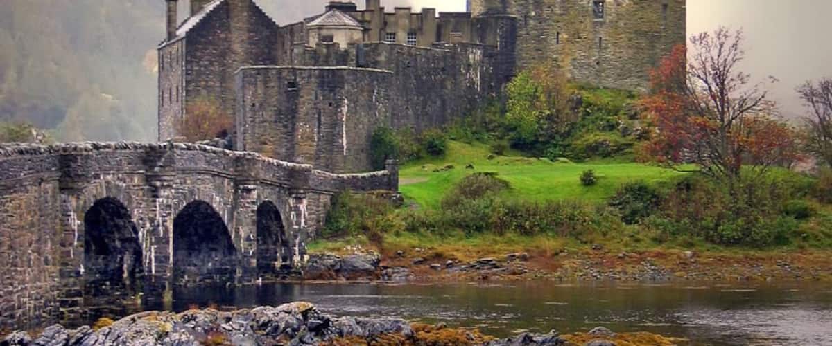 View On Black This is the Eilean Donan castle in the highlands (Scotland - UK - see map). A castle full of legend that also hosted the film Highlander as some others. It is a heavily processed picture initialy made with my first digital camera. The moon has been inserted in the mist to add some mysterious mood to the picture. In Explore: bighugelabs.com/flickr/scout.php?mode=history&id=3555... The list of my "Explore" photos: By best score or presented on black