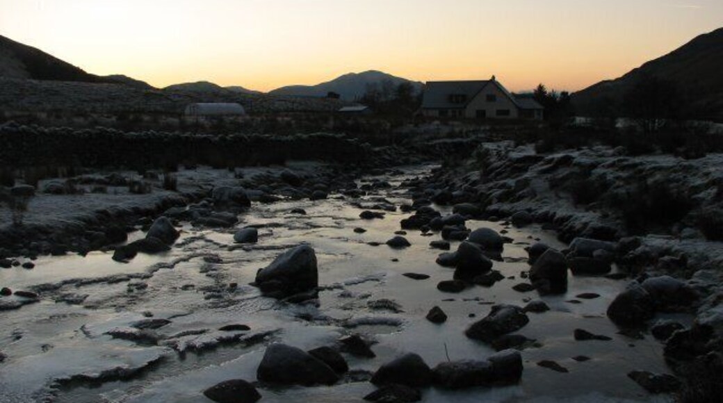 River Glennan In a valley sheltered from the winter sun the River Glennan has become largely frozen after a period of very cold weather.