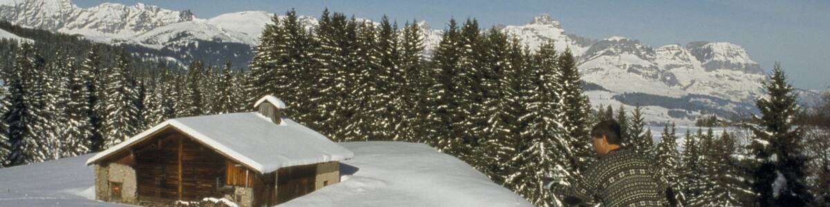 Megeve which includes a small town or village, snow and landscape views