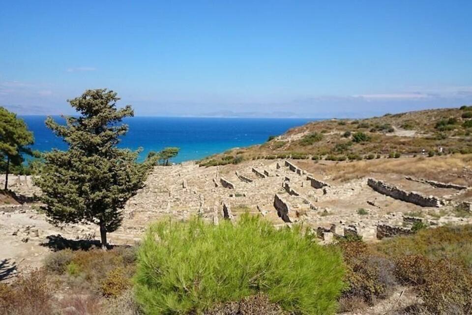 Ancient ruins with a view of the sea.