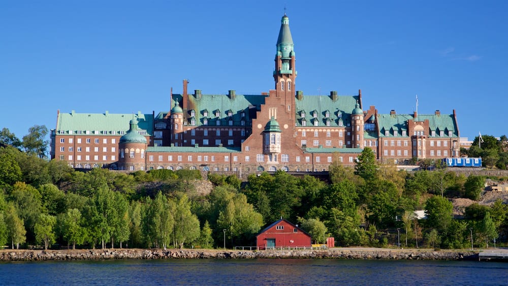 Vaxholm featuring a lake or waterhole and heritage architecture