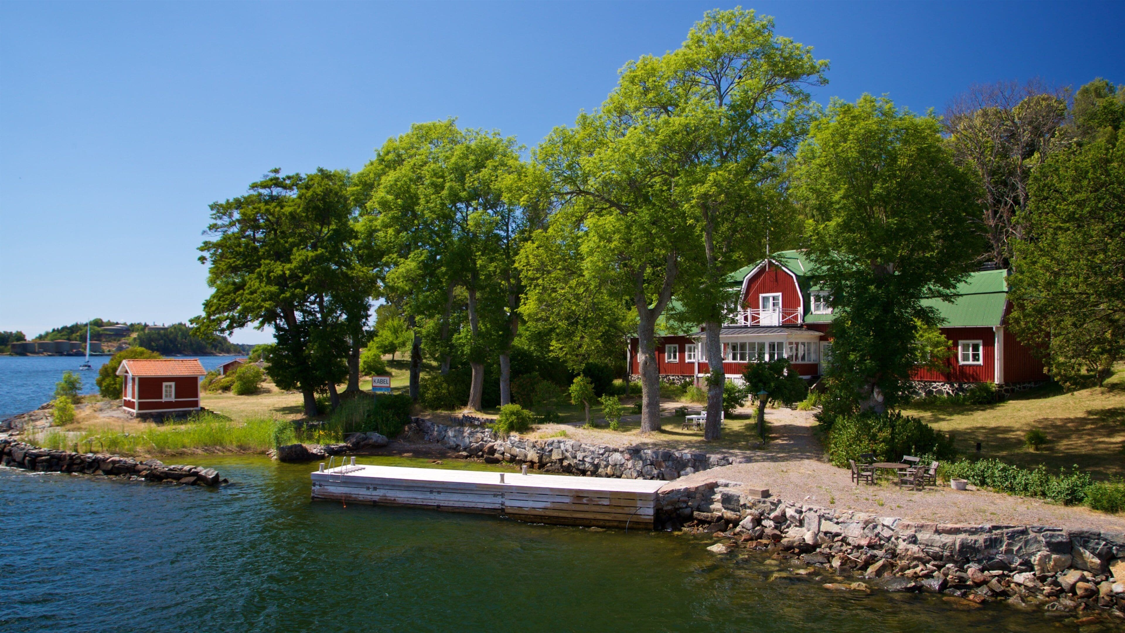 Vaxholm featuring a lake or waterhole and a small town or village