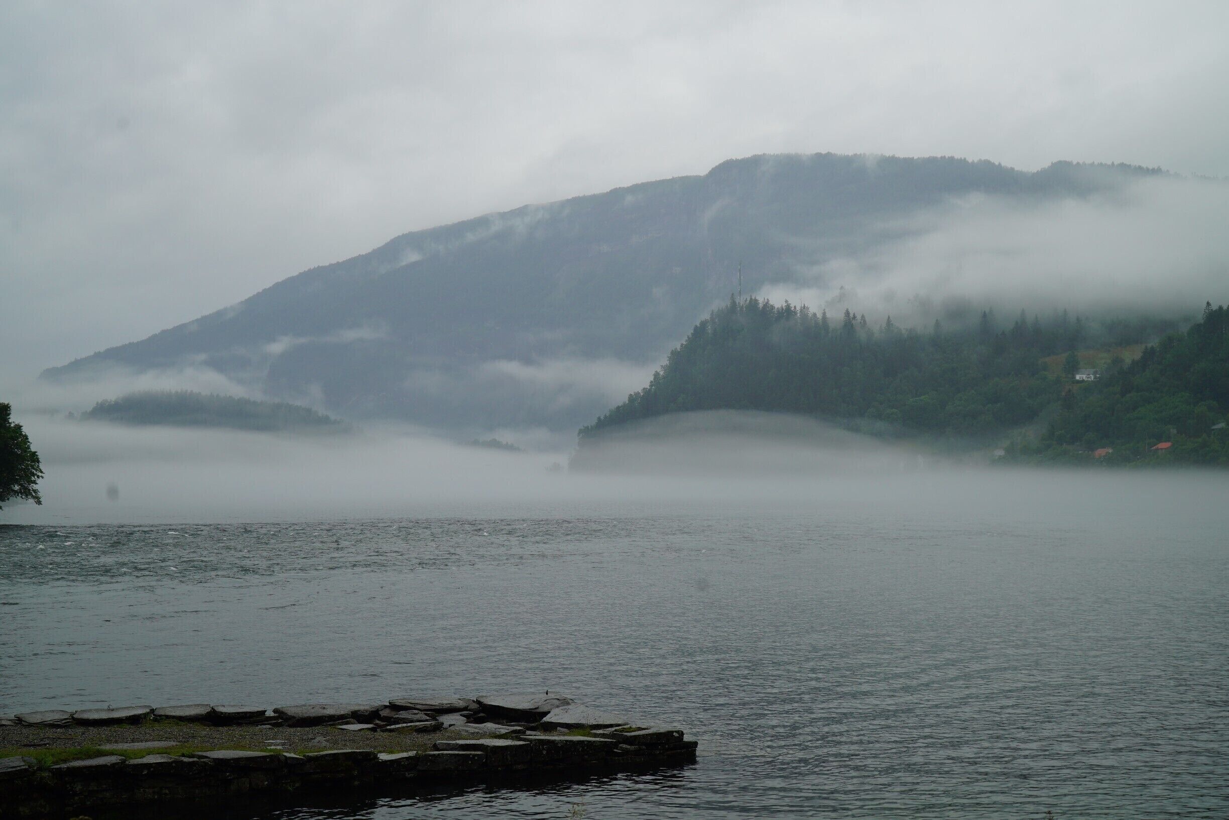 This river runs right along the main highway to Bergen and on this day was socked in by low lying clouds and fog.