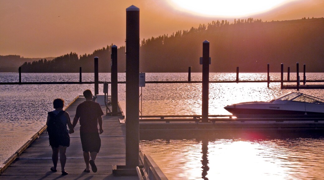 Harrison showing a sunset as well as a couple