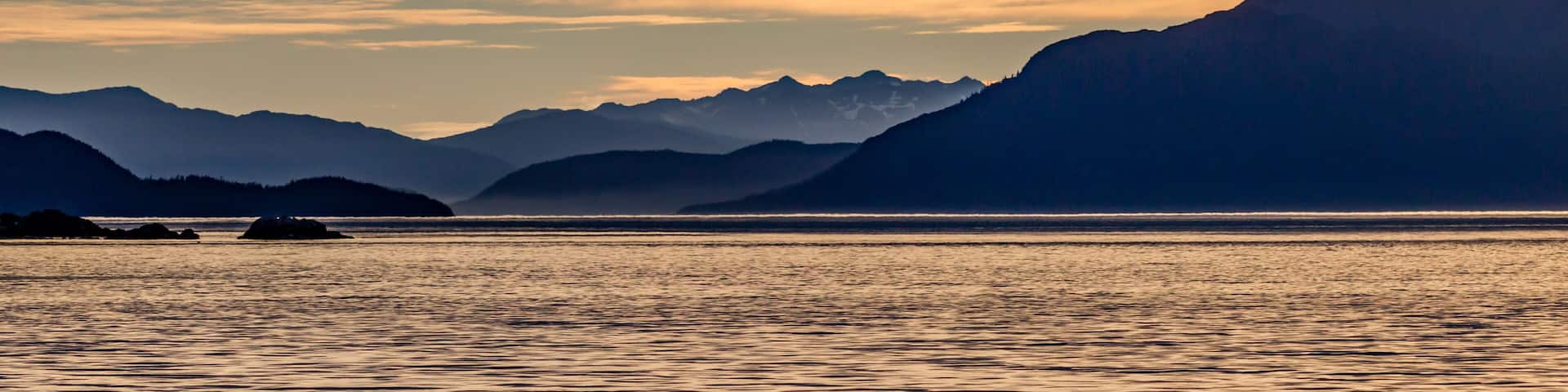 Dramatic sunset near Elfin cove in Alaska
