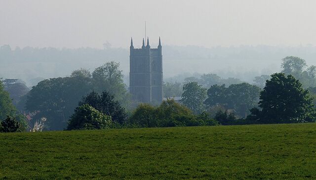 Dedham church from Moorat's Park. A similar view to 1054403 but on a misty Spring morning instead of a clear winter one.