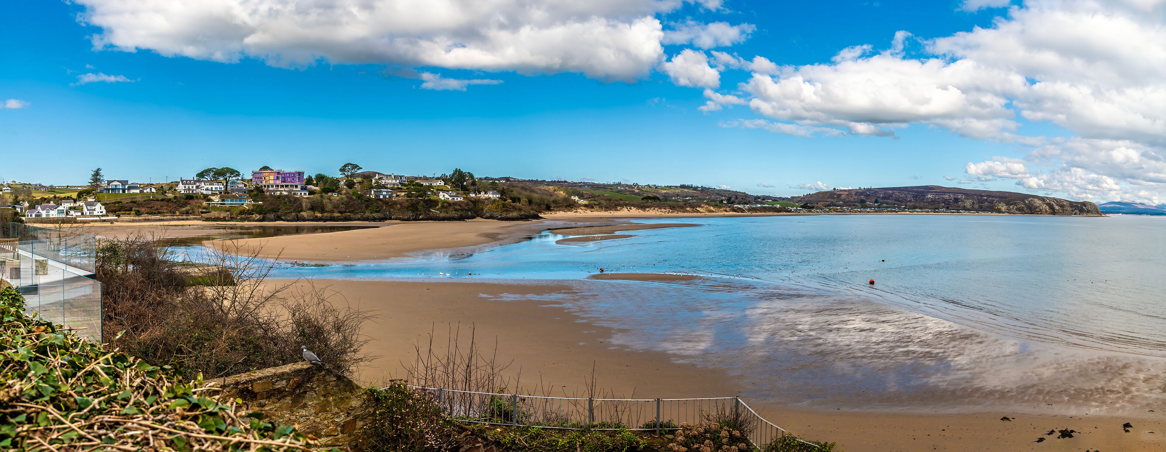 A panorama  view from the cliff path over the estuary at the town of Abersoch, Wales in springtime