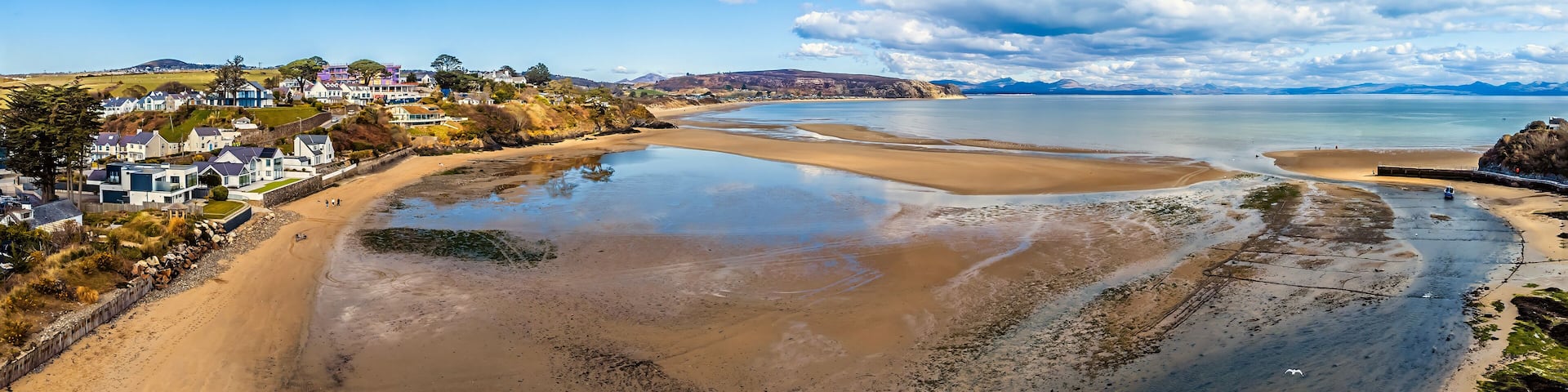 A panorama aerial view over the River Soch estuary from the town of Abersoch, Wales in springtime