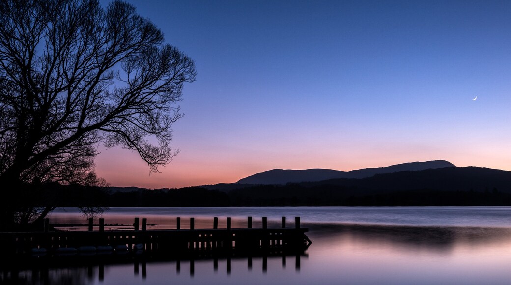 Lake District National Park which includes a sunset and a lake or waterhole