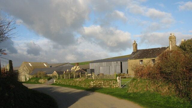 Bodwyddog Farm This photo was taken in the late afternoon as the shadows lengthened. The Benallt Mine Tramway emerged out on to the road to the right of the farmhouse and crossed over to the western side of the road. It kept to this side for the remainder of the journey to Porth Ysgo SH2026
