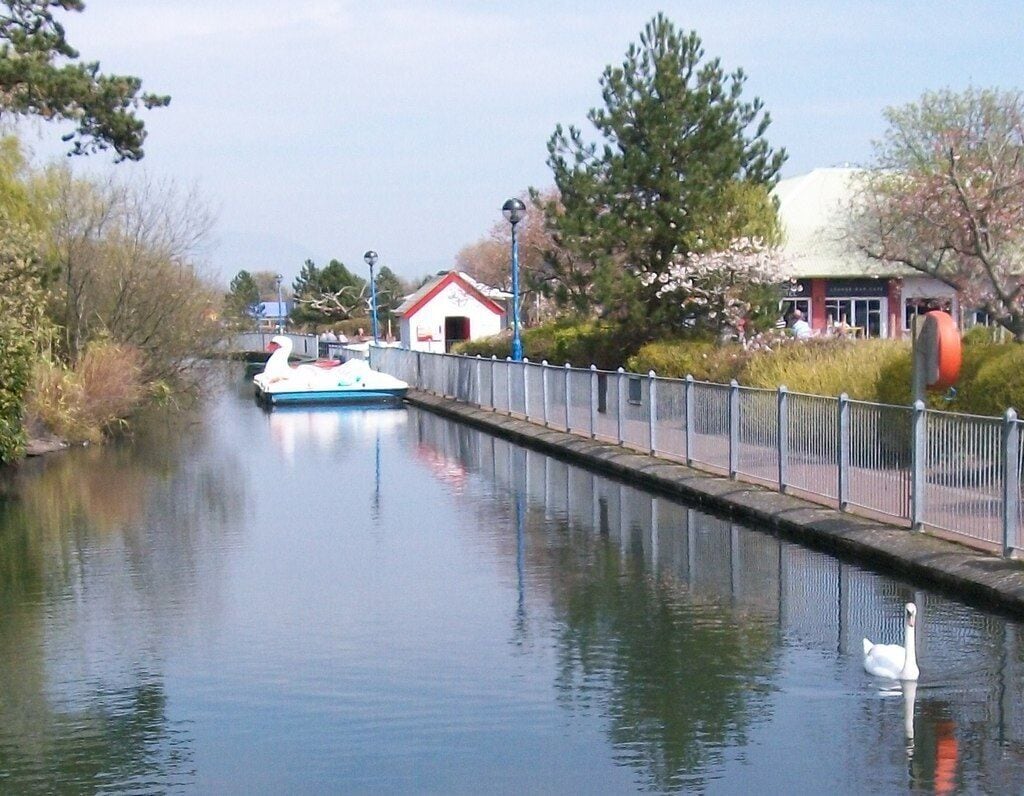 View eastwards across the boating lake at Hafan y M�r Holiday Park, near to Chwilog, Gwynedd, Great Britain.
