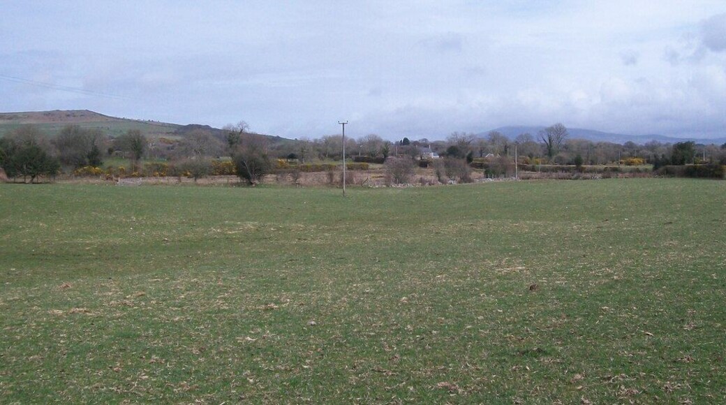 View northeastwards across grazing land with Bryn Caled Farm in the background
