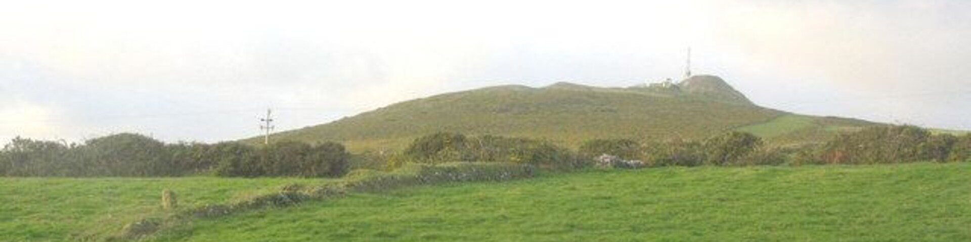 Mynydd Rhiw The radar tracking station can be seen next to the boss of volcanic rock.