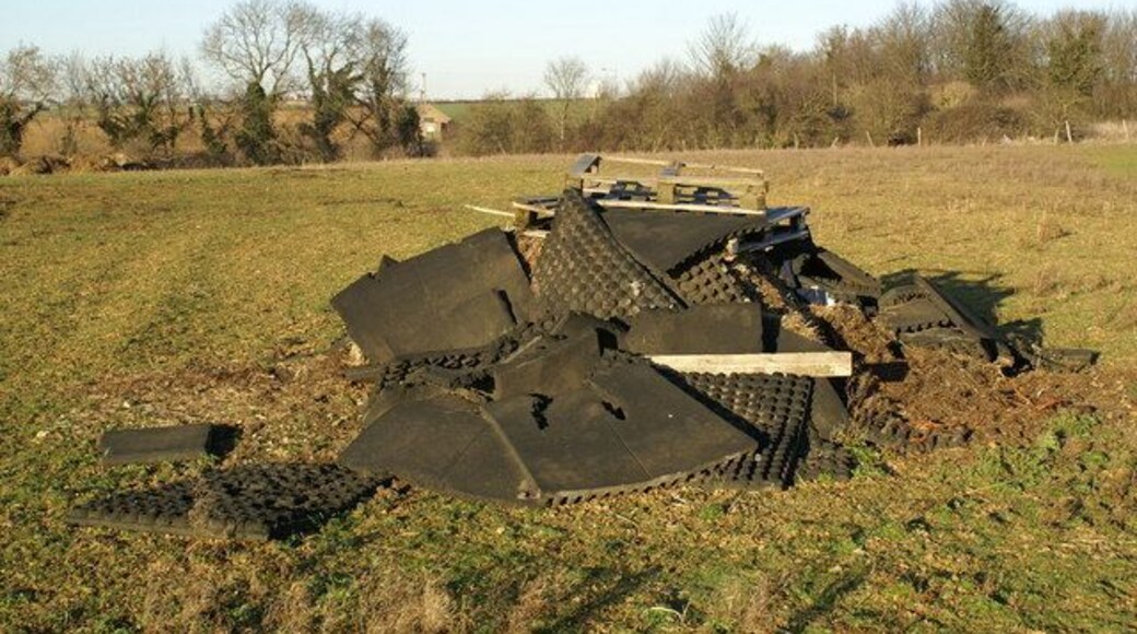 Foam Pile near Collyweston Quarry The main features in SK9901 are the A43 and A47 which intersect at a large roundabout. The entrance to Collyweston Quarry lies in the SE corner and just to its west is a little used footpath on the right of this photo. The quarry extends much further south than is shown on current OS maps forcing some deviations of the path.