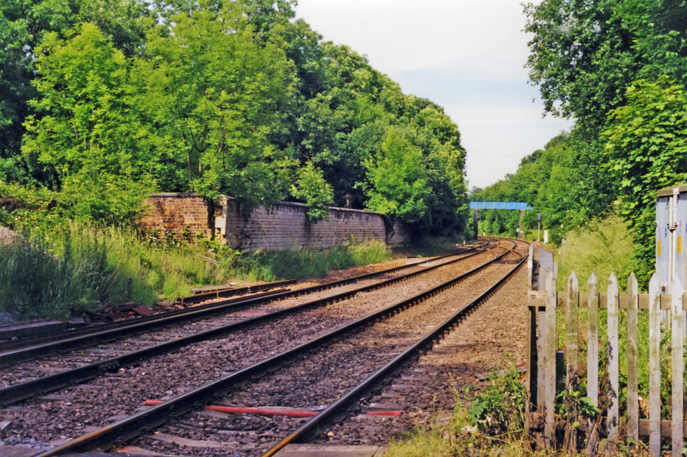 Site of former Ketton & Collyweston station, 1998. View SW, towards Manton, Melton Mowbray etc.: ex-Midland Melton Mowbray - Manton - Stamford - Peterborough secondary main line. The line remains active, but this station was closed 6/6/66.
