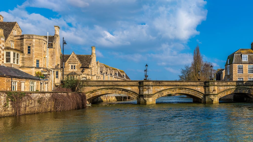 A view along the River Welland towards Stamford Bridge in Stamford, Lincolnshire, UK in springtime