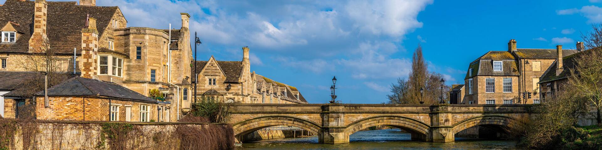 A view along the River Welland towards Stamford Bridge in Stamford, Lincolnshire, UK in springtime