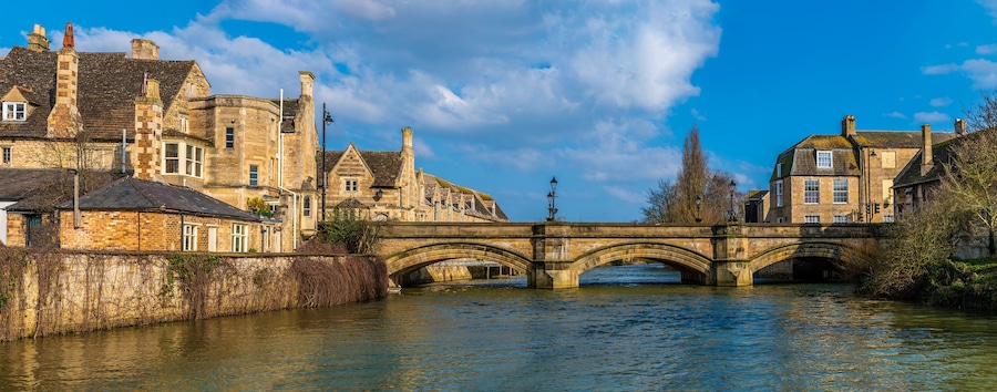 A view along the River Welland towards Stamford Bridge in Stamford, Lincolnshire, UK in springtime
