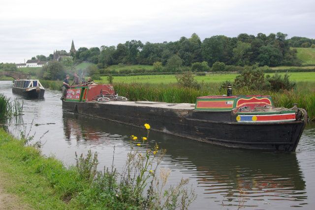 Erewash Canal, near Sandiacre The working narrowboat in the foreground was chugging along slowly up the canal approaching Pasture Lock, towing the privately owned cruising narrowboat behind.