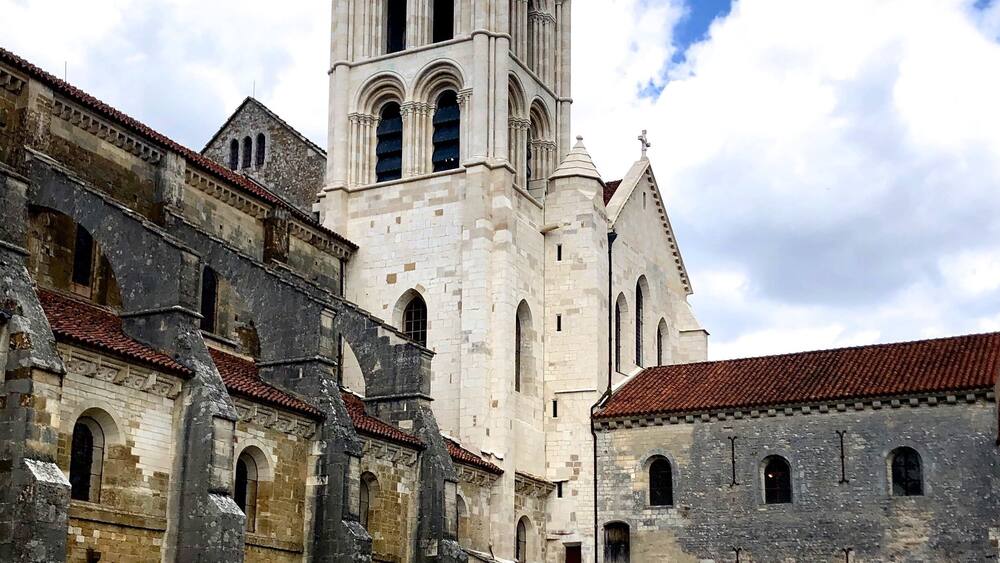 Vézelay Abbey or Abbaye Sainte-Marie-Madeleine de Vézelay is a Benedictine and Cluniac monastery in Vézelay in the Yonne department in northern Burgundy, France. The Benedictine abbey church, now the Basilica of Sainte-Marie-Madeleine, with its complicated program of imagery in sculpted capitals and portals, is one of the outstanding masterpieces of Burgundian Romanesque art and architecture. Sacked by the Huguenots in 1569, the building suffered neglect in the 17th and the 18th centuries and some further damage during the period of the French Revolution.
The church and hill at Vézelay were added to the UNESCO list of World Heritage Sites in 1979.