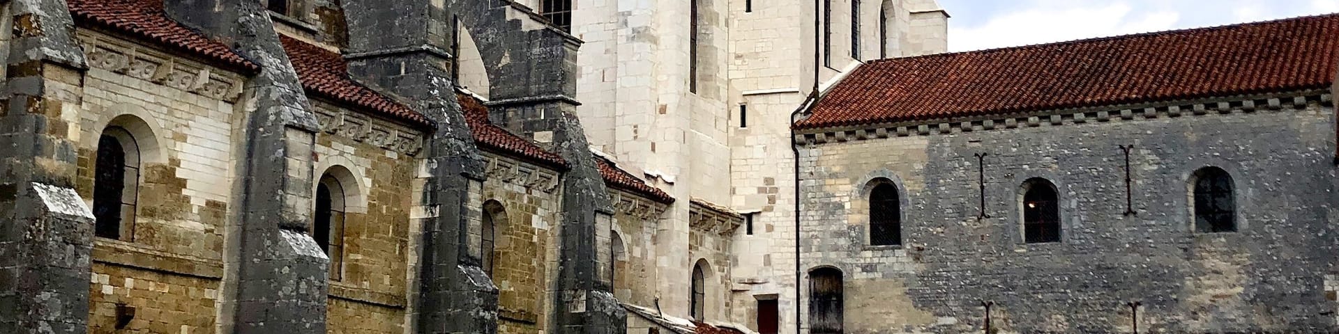 Vézelay Abbey or Abbaye Sainte-Marie-Madeleine de Vézelay is a Benedictine and Cluniac monastery in Vézelay in the Yonne department in northern Burgundy, France. The Benedictine abbey church, now the Basilica of Sainte-Marie-Madeleine, with its complicated program of imagery in sculpted capitals and portals, is one of the outstanding masterpieces of Burgundian Romanesque art and architecture. Sacked by the Huguenots in 1569, the building suffered neglect in the 17th and the 18th centuries and some further damage during the period of the French Revolution.
The church and hill at Vézelay were added to the UNESCO list of World Heritage Sites in 1979.