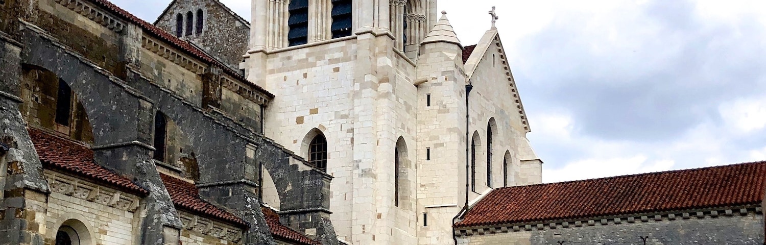 Vézelay Abbey or Abbaye Sainte-Marie-Madeleine de Vézelay is a Benedictine and Cluniac monastery in Vézelay in the Yonne department in northern Burgundy, France. The Benedictine abbey church, now the Basilica of Sainte-Marie-Madeleine, with its complicated program of imagery in sculpted capitals and portals, is one of the outstanding masterpieces of Burgundian Romanesque art and architecture. Sacked by the Huguenots in 1569, the building suffered neglect in the 17th and the 18th centuries and some further damage during the period of the French Revolution.
The church and hill at Vézelay were added to the UNESCO list of World Heritage Sites in 1979.