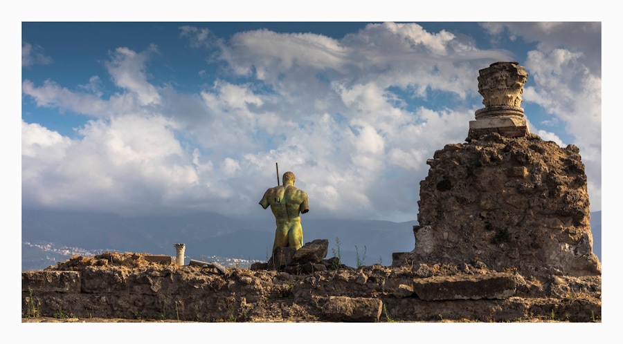 Pompei is a special location with a vast city that will have you exploring in awe for hours.
the image I wanted was slightly off the iconic spot and I found this as expressing the strength of the place over the horror of the events.
Its a shame that Vesuvius was cloudy..