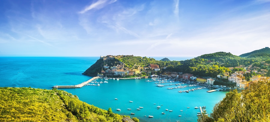 Porto Ercole village and harbor in a sea bay. Aerial view, Argentario, Tuscany, Italy
