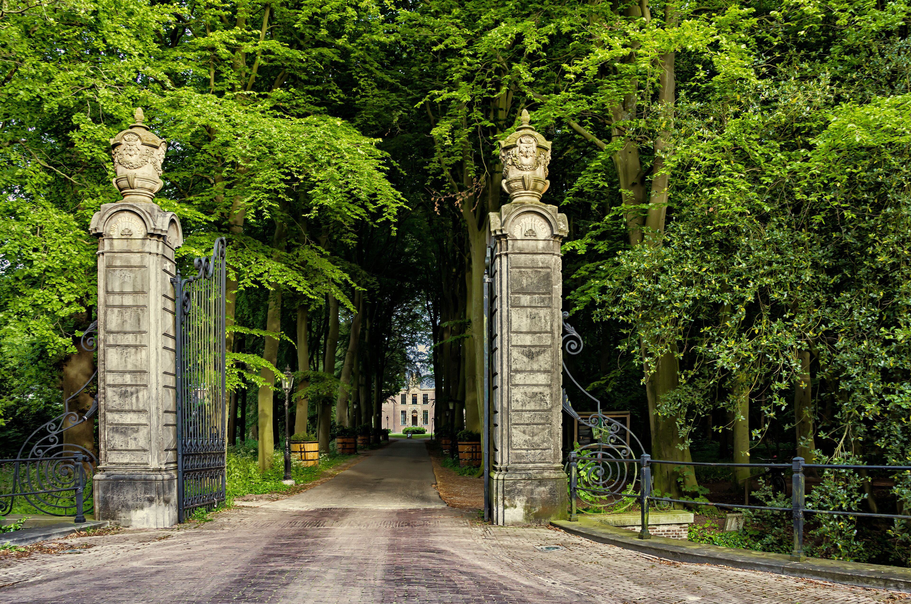 Leiden, Holland, Netherlands, May 22, 2019, The gates and road to the medievalCastle (Kasteel) Oud Poelgeest, 1668 in Oegstgeest, the former home of the Dutch scientist Herman Boerhaave (1668-1738)