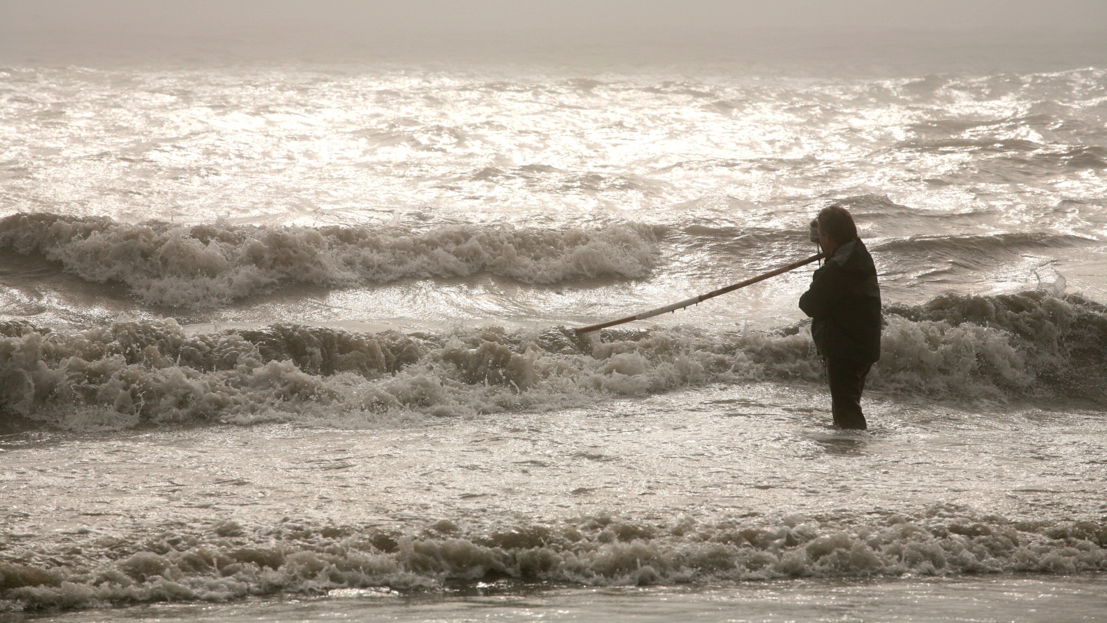 Kenai which includes fishing, a bay or harbor and surf