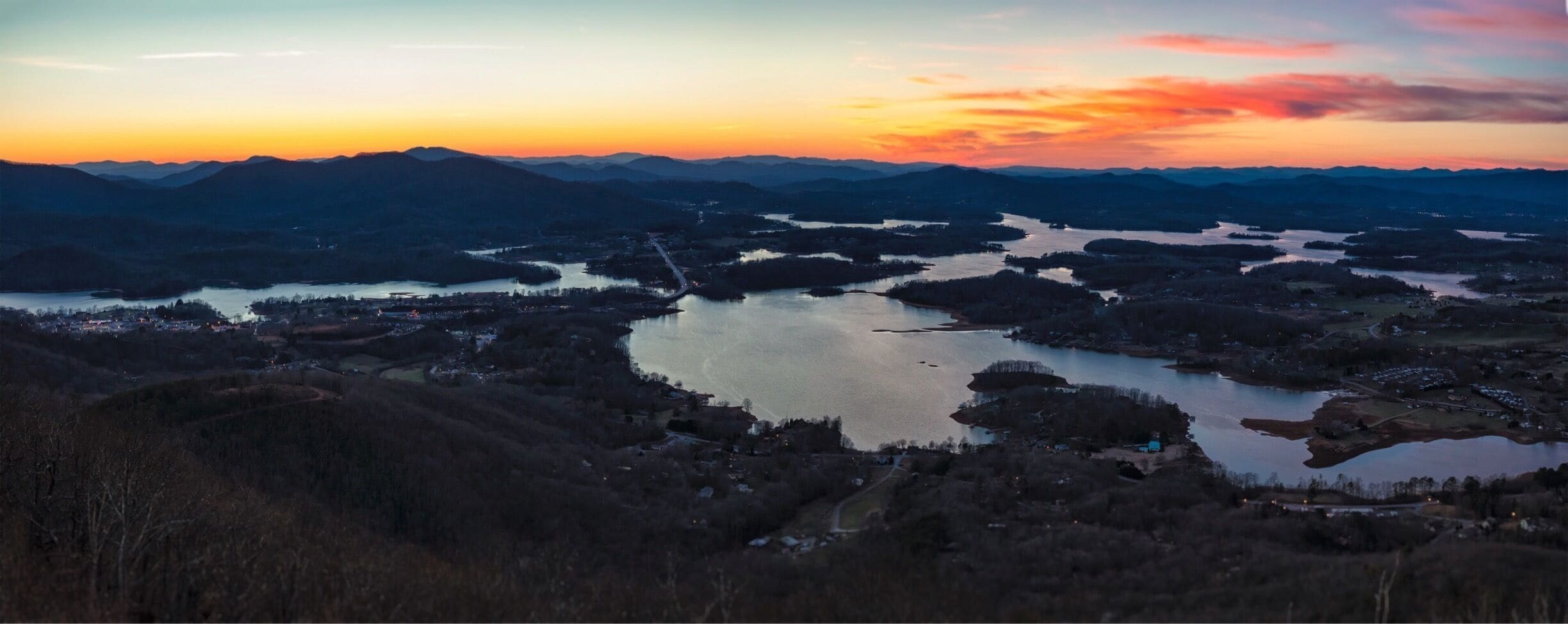 Bell mountain has received a facelift. To the dismay of some, but the Benefit of all it is now a public viewpoint with a paved road all the way to the top. At the top you will now find multiple observation balconies. It stoically stands over Lake Chatuge. From here you can see the North Carolina, Tennessee, and Georgia smokies. 