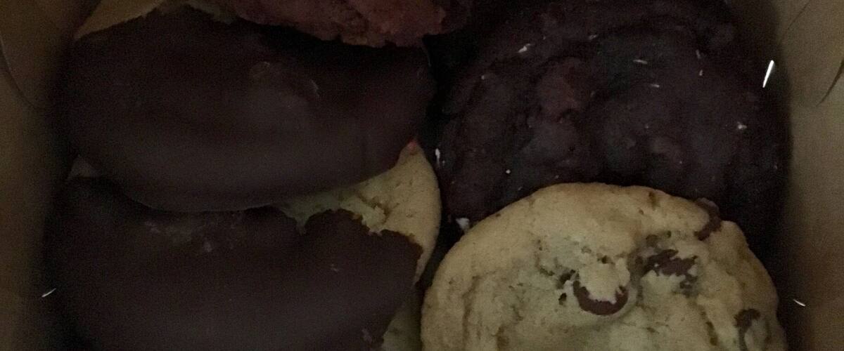 A box containing various types of cookies.