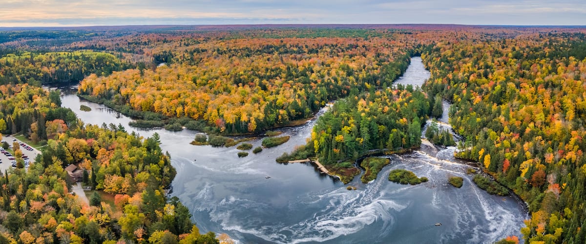 Autumn colors of Lower Tahquamenon Falls basin in Tahquamenon State Park in the Michigan Upper Peninsula - waterfall
