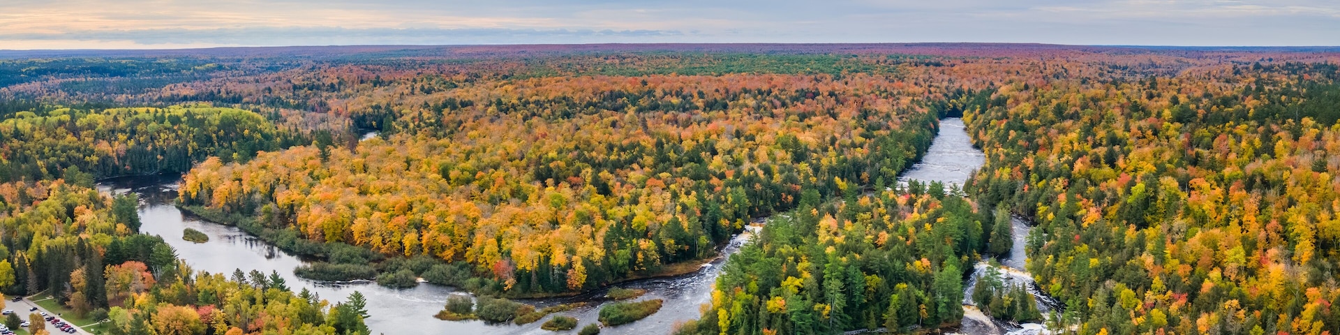 Autumn colors of Lower Tahquamenon Falls basin in Tahquamenon State Park in the Michigan Upper Peninsula - waterfall