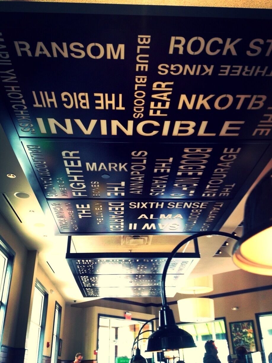 At Wahlburgers. Famous burger place of Paul, Donnie, Mark Wahlberg. I love the Ceiling that showcases their movies, songs, etc.. 