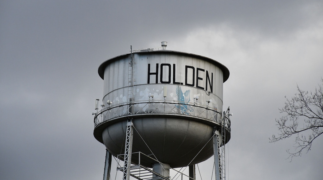 A water tower with the word 'HOLDEN' on it.