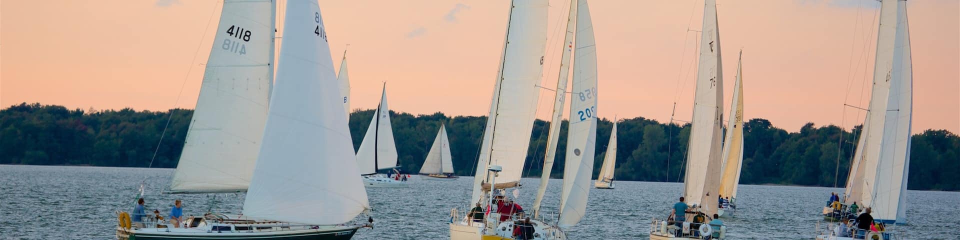 Erie featuring a lake or waterhole, sailing and a sunset