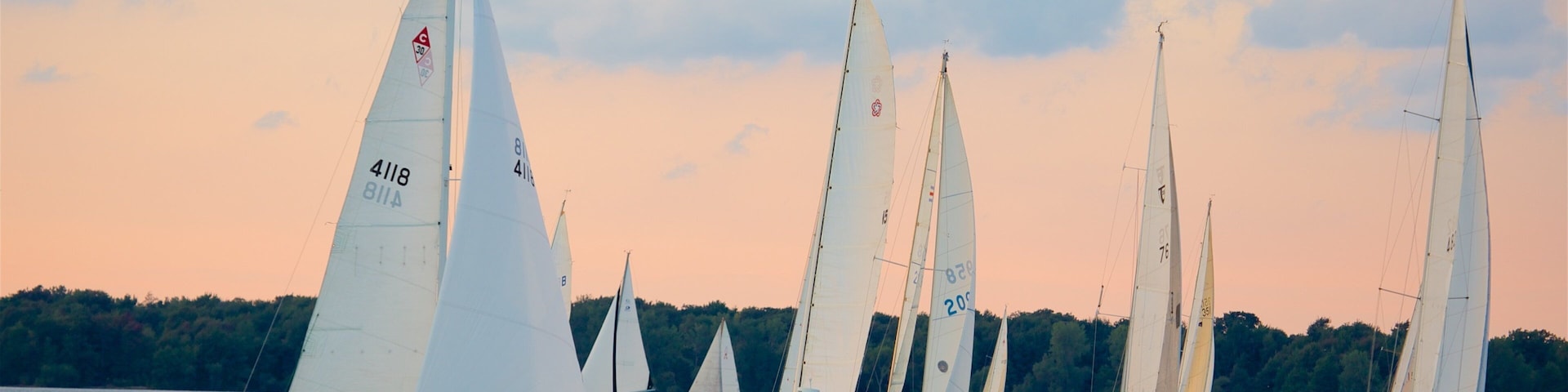 Erie featuring a lake or waterhole, sailing and a sunset