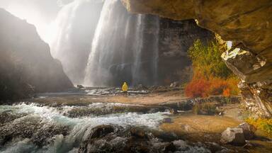 Panoramic image of Tortum (Uzundere) waterfall from down in Uzundere. Landscape view of Tortum Waterfall in Tortum,Erzurum,Turkey. Explore the world's beauty and wildlife.
