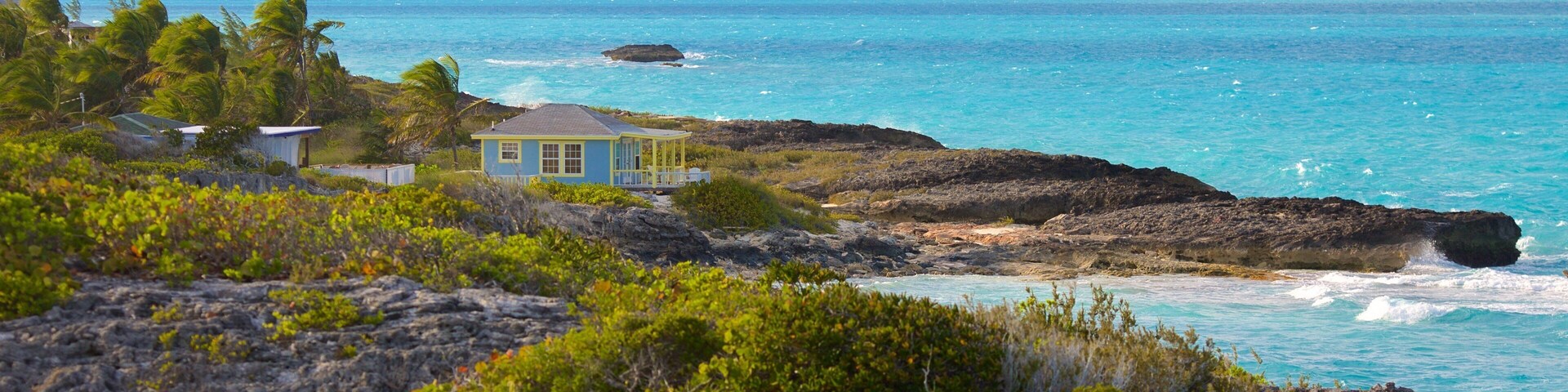 William\'s Town which includes a house, rocky coastline and general coastal views