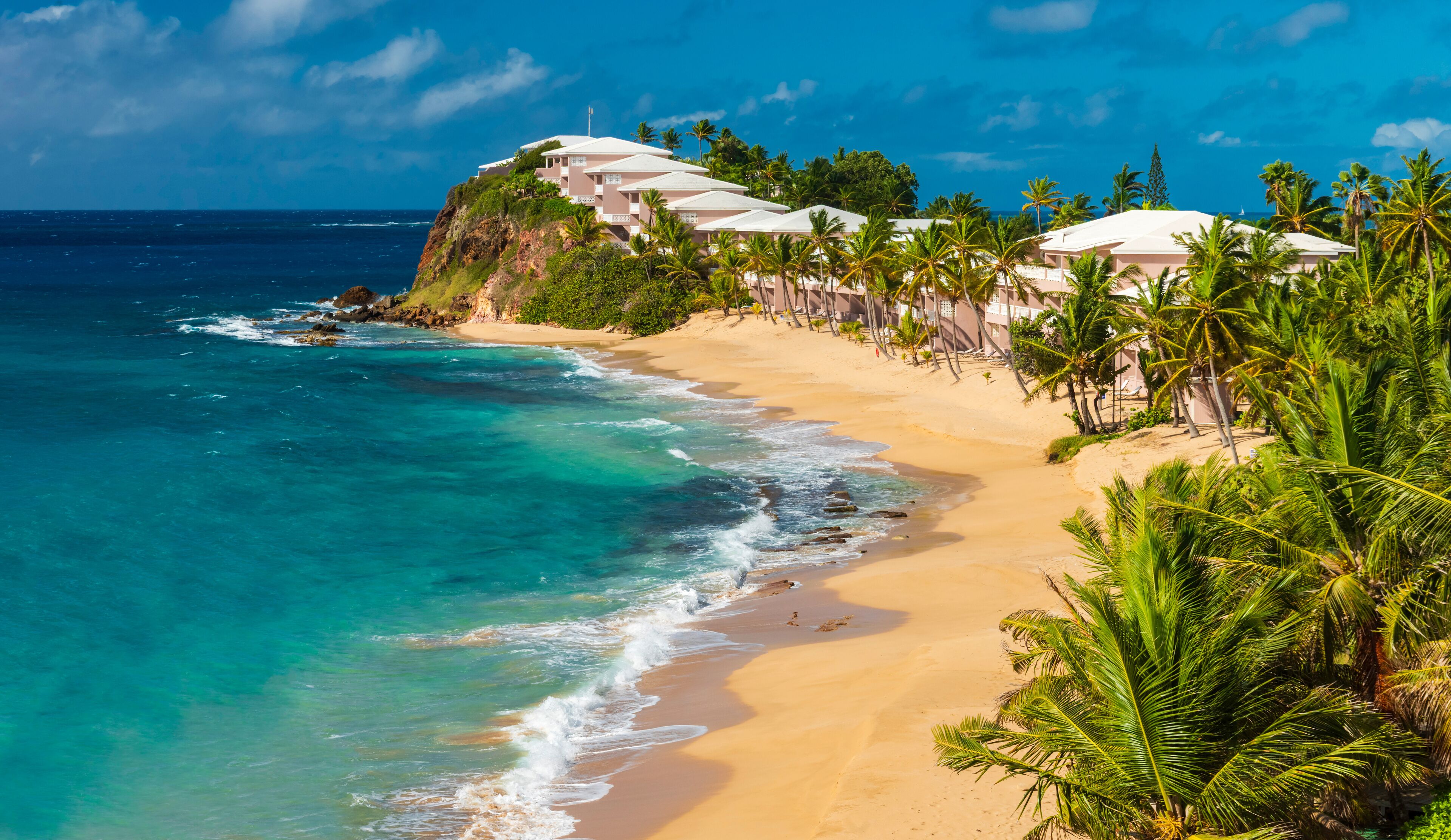 Serene golden sands and azure sea at Valley Church Beach, Antigua