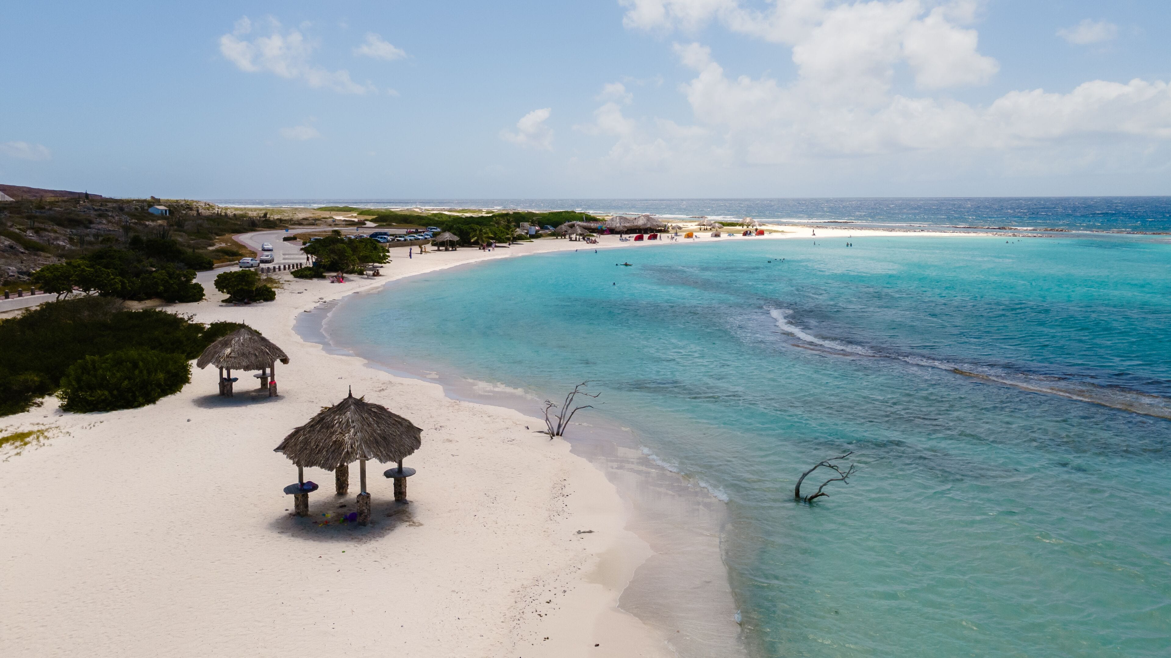 Experience the serene beauty of Baby Beach in San Nicolas Zuid, Aruba for an unforgettable vacation